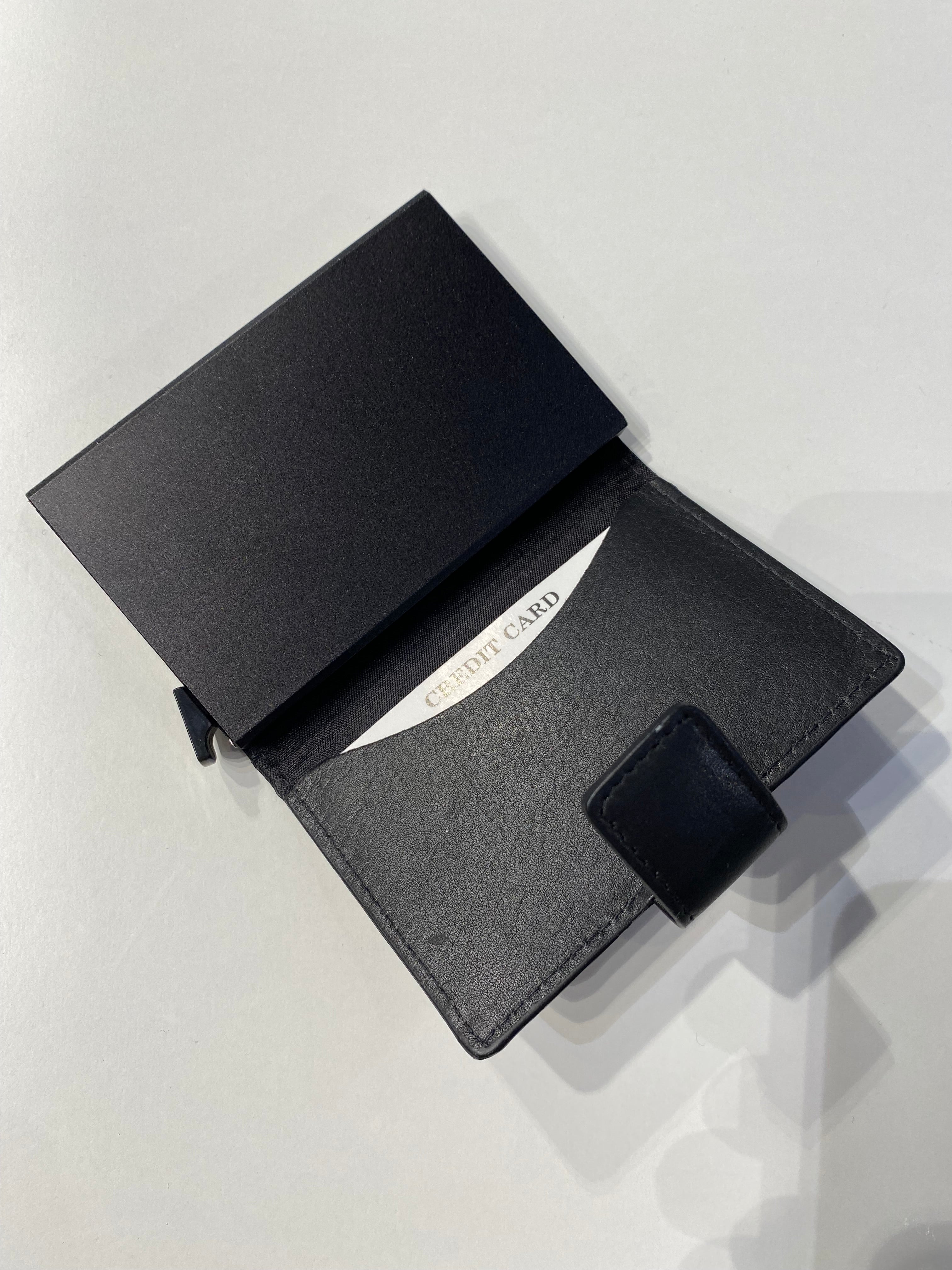 KORT HOLDER SORT